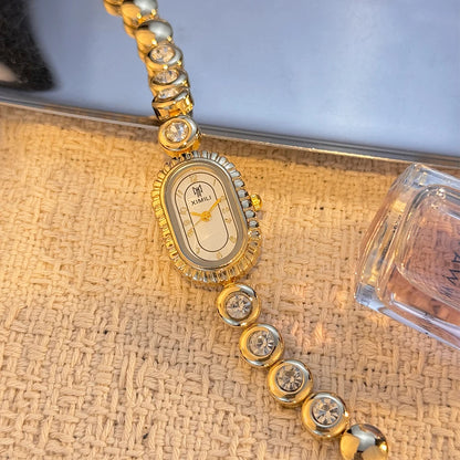 New Arrival Elegant Oval Shape Compact Gold Watch for Women Vintage Elegance Luxury Diamond Embedded Bracelet Quartz Wristwatch