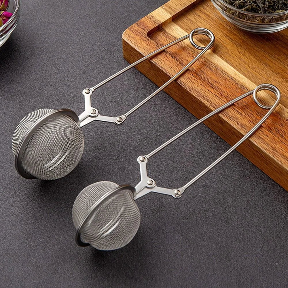 1PC Creative Stainless Steel Tea Ball Infuser Filter Squeeze Leaves Herb Mesh Strainer Tea Infuser Reusable Teapot Gadgets