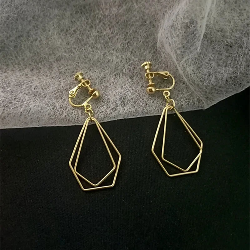 Korean Temperament Gold Color Butterfly Earrings Fashion Simple Hollow Out Geometric Clip on Earrings for Women Without Piercing