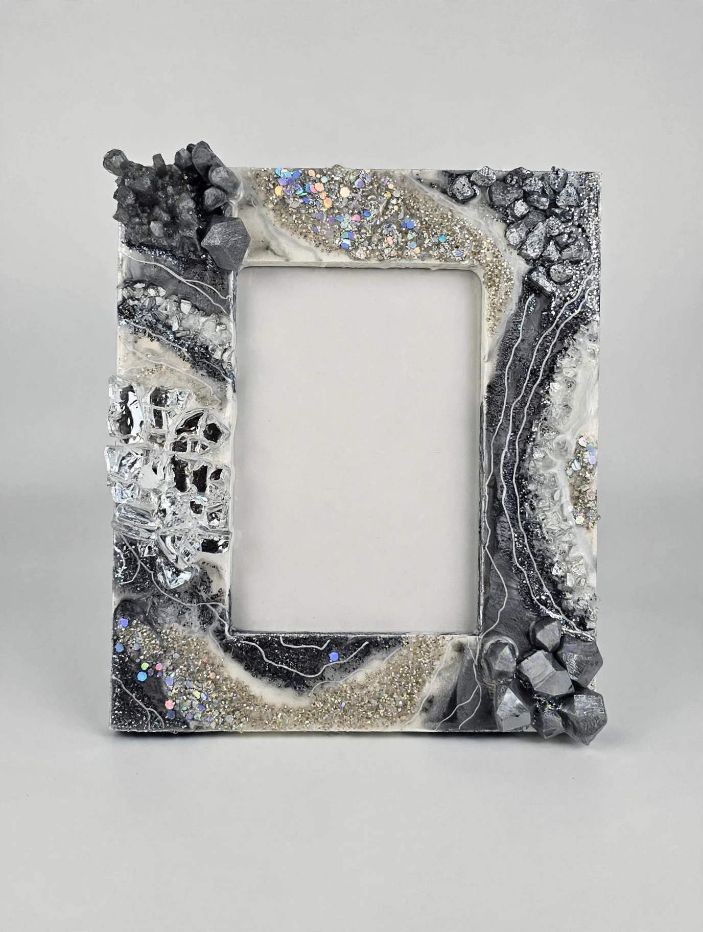 Resin geode photo frame on white background