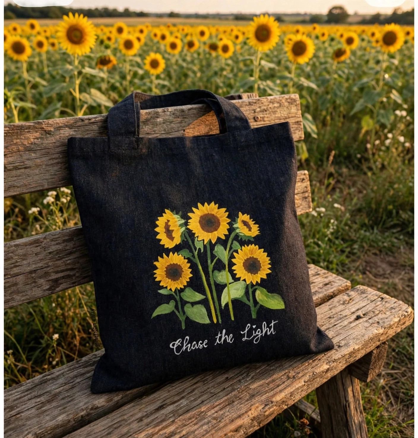 Black sunflower Chase the Light tote — lifestyle image