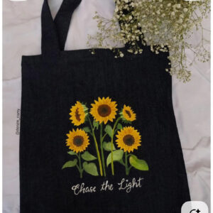 Black sunflower Chase the Light tote — main product image